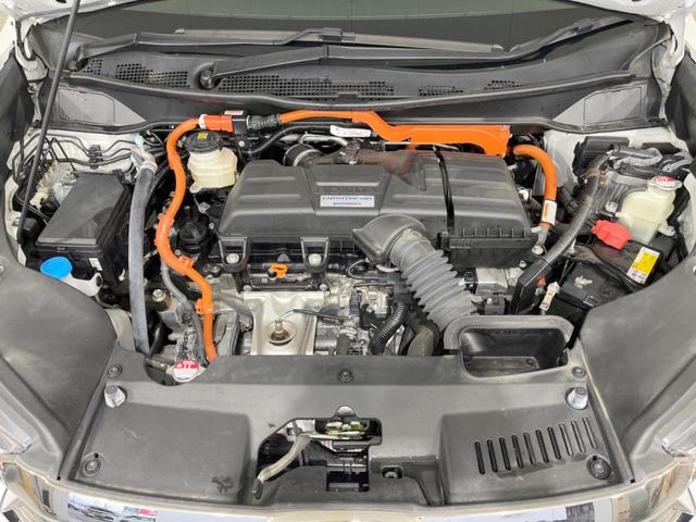 オデッセイハイブリッド ｅ：ＨＥＶアブソルート・ＥＸ　禁煙車　純正１０型ナビ　全周囲カメラ　黒革シート　両側電動スライドドア　ホンダセンシング　アダプティブクルーズ　ＥＴＣ２．０　ドラレコ　シートヒーター　電動リアゲート　ＬＥＤヘッドライト　１００Ｖ電源（18枚目）