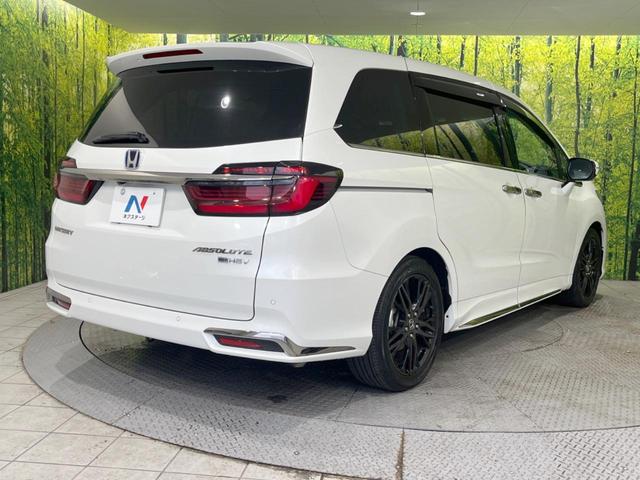 オデッセイハイブリッド ｅ：ＨＥＶアブソルート・ＥＸ　禁煙車　純正１０型ナビ　全周囲カメラ　黒革シート　両側電動スライドドア　ホンダセンシング　アダプティブクルーズ　ＥＴＣ２．０　ドラレコ　シートヒーター　電動リアゲート　ＬＥＤヘッドライト　１００Ｖ電源（65枚目）