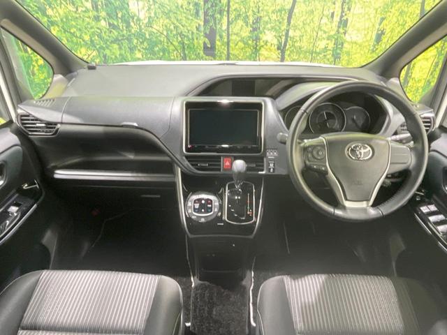 ヴォクシー ＺＳ　煌ＩＩ　禁煙車　純正９型ナビ　後席モニター　両側電動スライドドア　セーフティセンス　バックカメラ　ＥＴＣ　Ｂｌｕｅｔｏｏｔｈ　フルセグ　ＬＥＤヘッド／フロントフォグ　リアオートエアコン　クルーズコントロール（2枚目）