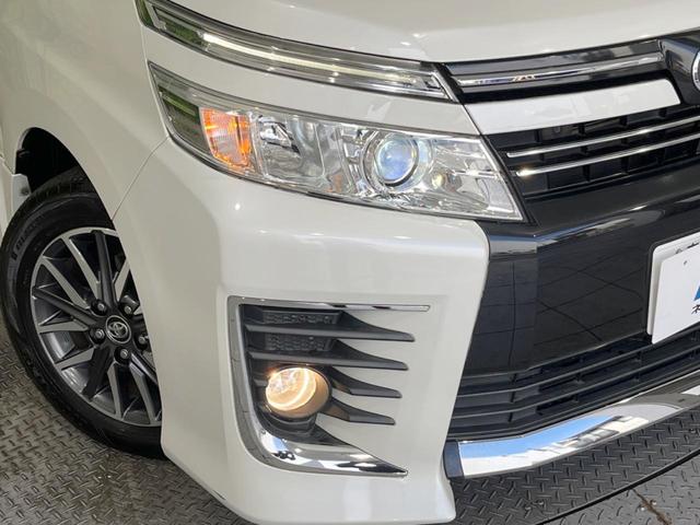 ヴォクシー ＺＳ　煌　純正ＳＤナビ　両側電動スライドドア　禁煙車　ＬＥＤヘッドランプ　アイドリングストップ　１６インチアルミ　スマートキー　デュアルオートエアコン　革巻ステアリングホイール　エアロバンパー（13枚目）