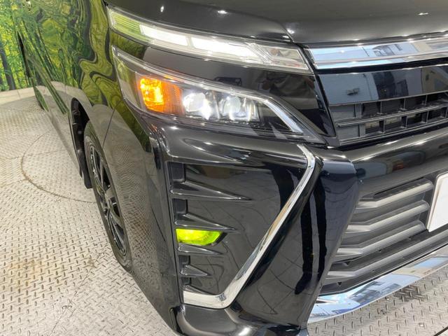 ヴォクシー ＺＳ　煌　禁煙車　メモリーナビ　フリップダウンモニター　両側電動スライドドア　柿本マフラー　革調シートカバー　ＬＥＤヘッドランプ　ＬＥＤフォグランプ　セーフティセンス　ダブルエアコン　スマートキー　オートライト（13枚目）