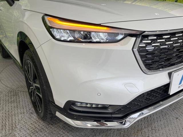 ヴェゼル ｅ：ＨＥＶ　Ｚ　純正エアロ　９型メーカーナビ　バックカメラ　ホンダセンシング　レーダークルーズ　ＢＳＭ　禁煙車　電動リアゲート　ハーフレザーシート　シートヒーター　ドラレコ　コーナーセンサー　ＬＥＤヘッド／フォグ（12枚目）