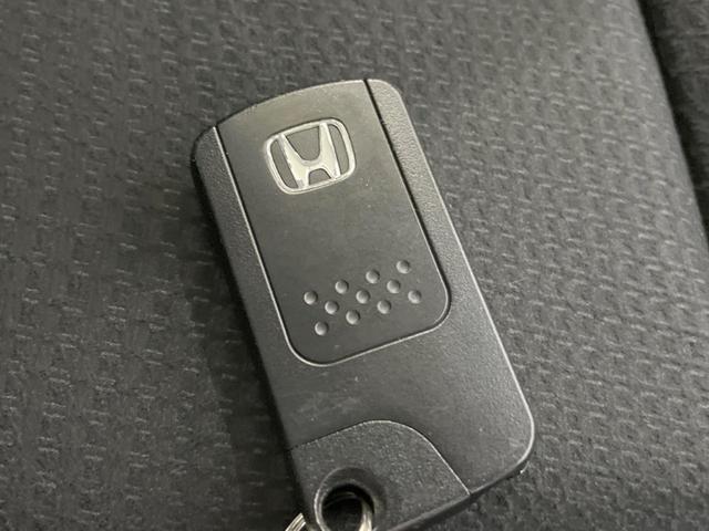 ステップワゴンスパーダ Z 後席モニター 両側電動スライドドア 純正9型ナビ バックカメラ 禁煙車 クルコン 前後ドラレコ スマートキー HIDヘッド ビルトインETC オートライト オートエアコン 純正16インチAW(34枚目)