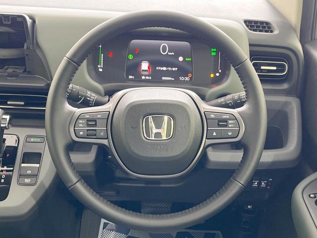 フリード e:HEVクロスター 登録済未使用車 両側電動スライドドア ホンダセンシング アダプティブクルーズ LEDヘッド/フロントフォグ シートヒーター ハーフレザーシート スマートキー ルーフレール 純正15インチAW(12枚目)