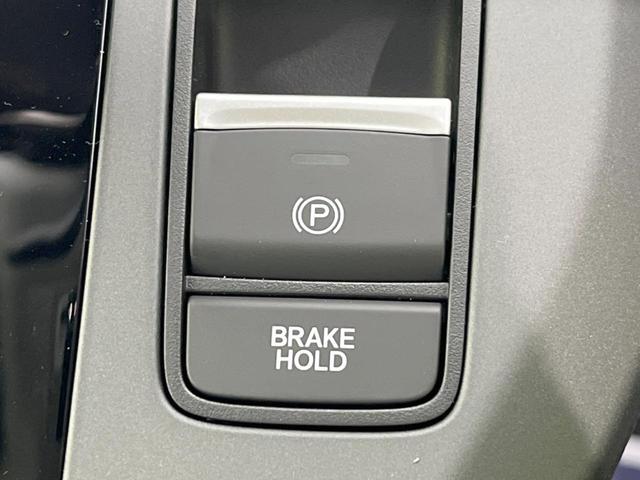 フリード e:HEVクロスター 登録済未使用車 両側電動スライドドア ホンダセンシング アダプティブクルーズ LEDヘッド/フロントフォグ シートヒーター ハーフレザーシート スマートキー ルーフレール 純正15インチAW(26枚目)
