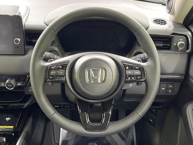 ヴェゼル ｅ：ＨＥＶ　Ｚ　登録済未使用車　９型メーカーナビ　全周囲カメラ　ホンダセンシング　ＢＳＭ　レーダークルーズ　電動リアゲート　ハーフレザーシート　コーナーセンサー　スマートキー　ＬＥＤヘッド　ＥＴＣ２．０（11枚目）