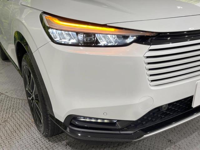 ヴェゼル ｅ：ＨＥＶ　Ｚ　登録済未使用車　９型メーカーナビ　全周囲カメラ　ホンダセンシング　ＢＳＭ　レーダークルーズ　電動リアゲート　ハーフレザーシート　コーナーセンサー　スマートキー　ＬＥＤヘッド　ＥＴＣ２．０（12枚目）