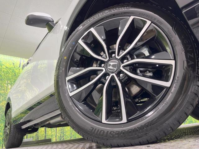 ヴェゼル ｅ：ＨＥＶ　Ｚ　登録済未使用車　９型メーカーナビ　全周囲カメラ　ホンダセンシング　ＢＳＭ　レーダークルーズ　電動リアゲート　ハーフレザーシート　コーナーセンサー　スマートキー　ＬＥＤヘッド　ＥＴＣ２．０（13枚目）