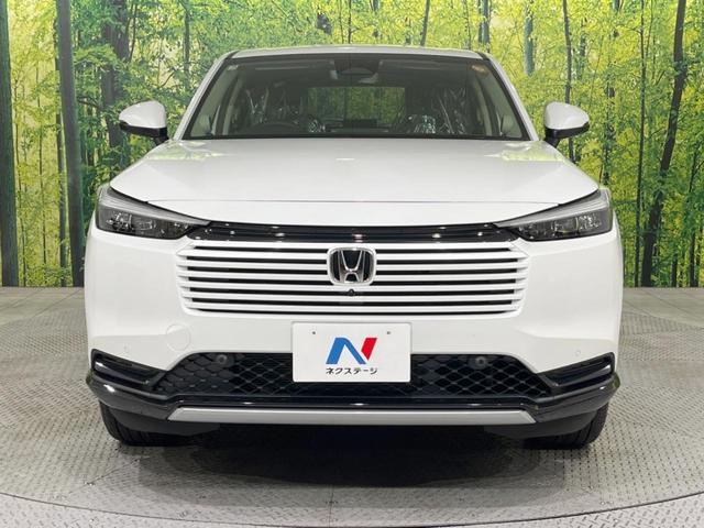 ヴェゼル ｅ：ＨＥＶ　Ｚ　登録済未使用車　９型メーカーナビ　全周囲カメラ　ホンダセンシング　ＢＳＭ　レーダークルーズ　電動リアゲート　ハーフレザーシート　コーナーセンサー　スマートキー　ＬＥＤヘッド　ＥＴＣ２．０（14枚目）