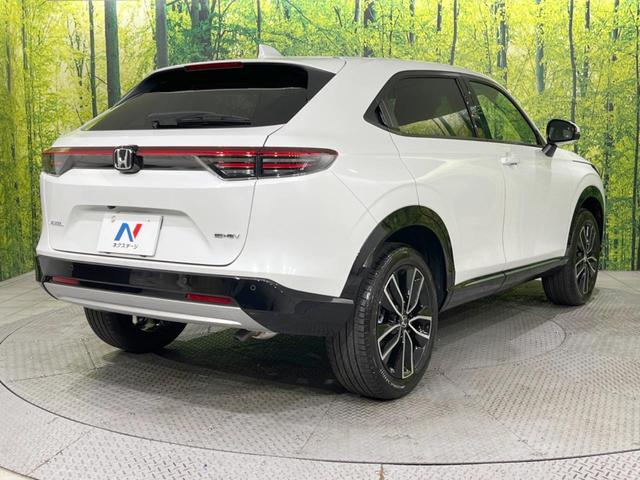 ヴェゼル ｅ：ＨＥＶ　Ｚ　登録済未使用車　９型メーカーナビ　全周囲カメラ　ホンダセンシング　ＢＳＭ　レーダークルーズ　電動リアゲート　ハーフレザーシート　コーナーセンサー　スマートキー　ＬＥＤヘッド　ＥＴＣ２．０（17枚目）