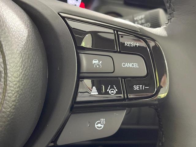 ヴェゼル ｅ：ＨＥＶ　Ｚ　登録済未使用車　９型メーカーナビ　全周囲カメラ　ホンダセンシング　ＢＳＭ　レーダークルーズ　電動リアゲート　ハーフレザーシート　コーナーセンサー　スマートキー　ＬＥＤヘッド　ＥＴＣ２．０（31枚目）