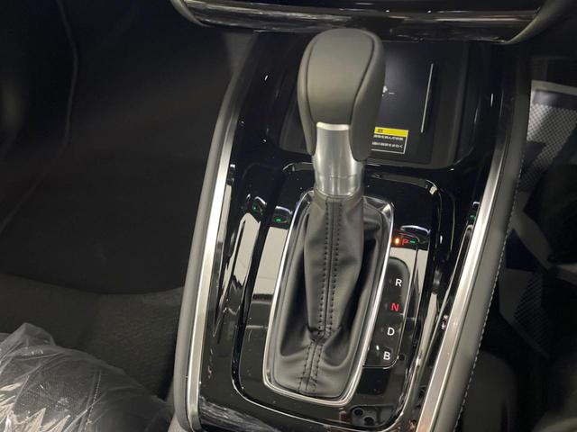 ヴェゼル ｅ：ＨＥＶ　Ｚ　登録済未使用車　９型メーカーナビ　全周囲カメラ　ホンダセンシング　ＢＳＭ　レーダークルーズ　電動リアゲート　ハーフレザーシート　コーナーセンサー　スマートキー　ＬＥＤヘッド　ＥＴＣ２．０（35枚目）