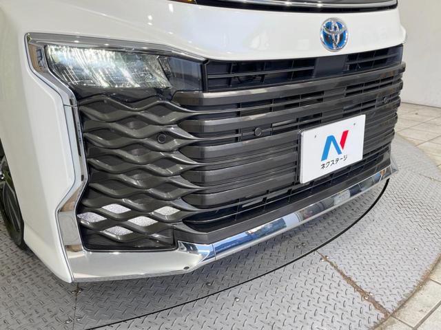 ヴォクシー ハイブリッドＳ－Ｚ　後席モニター　快適利便パッケージｈｉｇｈ　純正１０．５型ＤＡプラス　バックカメラ　ＢＳＭ　両側電動スライドドア　セーフティセンス　レーダークルーズ　電動リアゲート　禁煙車　前席中列シートヒーター（67枚目）