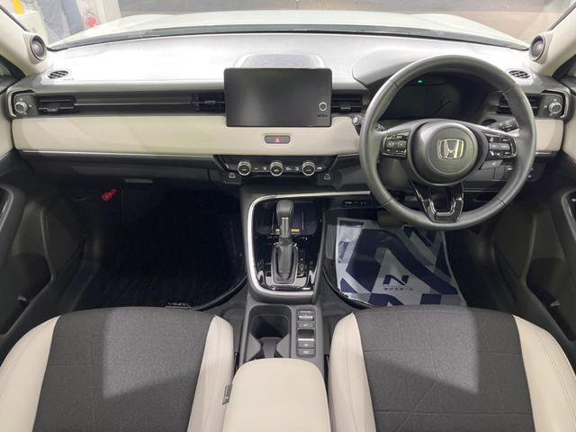 ヴェゼル ｅ：ＨＥＶ　Ｚ　９型メーカーナビ　全周囲カメラ　ホンダセンシング　レーダークルーズ　ＢＳＭ　禁煙車　電動リアゲート　ハーフレザーシート　ドラレコ　コーナーセンサー　スマートキー　ＬＥＤヘッド　ＥＴＣ２．０（2枚目）