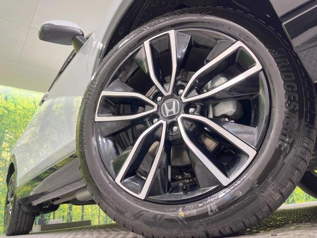 ヴェゼル ｅ：ＨＥＶ　Ｚ　９型メーカーナビ　全周囲カメラ　ホンダセンシング　レーダークルーズ　ＢＳＭ　禁煙車　電動リアゲート　ハーフレザーシート　ドラレコ　コーナーセンサー　スマートキー　ＬＥＤヘッド　ＥＴＣ２．０（13枚目）