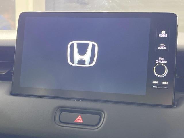 ヴェゼル ｅ：ＨＥＶ　Ｚ　登録済未使用車　メーカー９型ナビ　全周囲カメラ　プレミアムオーディオ　ホンダセンシング　アダプティブクルーズ　ＥＴＣ２．０　フルセグ　ワイヤレス充電　ハーフレザーシート　ハンズフリーパワーバックドア（3枚目）