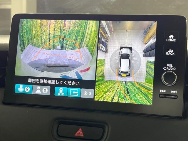 ヴェゼル ｅ：ＨＥＶ　Ｚ　登録済未使用車　メーカー９型ナビ　全周囲カメラ　プレミアムオーディオ　ホンダセンシング　アダプティブクルーズ　ＥＴＣ２．０　フルセグ　ワイヤレス充電　ハーフレザーシート　ハンズフリーパワーバックドア（4枚目）