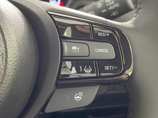 ヴェゼル ｅ：ＨＥＶ　Ｚ　登録済未使用車　メーカー９型ナビ　全周囲カメラ　プレミアムオーディオ　ホンダセンシング　アダプティブクルーズ　ＥＴＣ２．０　フルセグ　ワイヤレス充電　ハーフレザーシート　ハンズフリーパワーバックドア（5枚目）