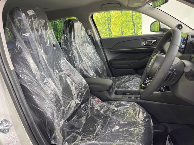 ヴェゼル ｅ：ＨＥＶ　Ｚ　登録済未使用車　メーカー９型ナビ　全周囲カメラ　プレミアムオーディオ　ホンダセンシング　アダプティブクルーズ　ＥＴＣ２．０　フルセグ　ワイヤレス充電　ハーフレザーシート　ハンズフリーパワーバックドア（8枚目）