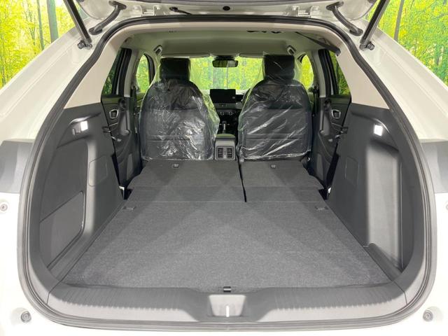 ヴェゼル ｅ：ＨＥＶ　Ｚ　登録済未使用車　メーカー９型ナビ　全周囲カメラ　プレミアムオーディオ　ホンダセンシング　アダプティブクルーズ　ＥＴＣ２．０　フルセグ　ワイヤレス充電　ハーフレザーシート　ハンズフリーパワーバックドア（10枚目）