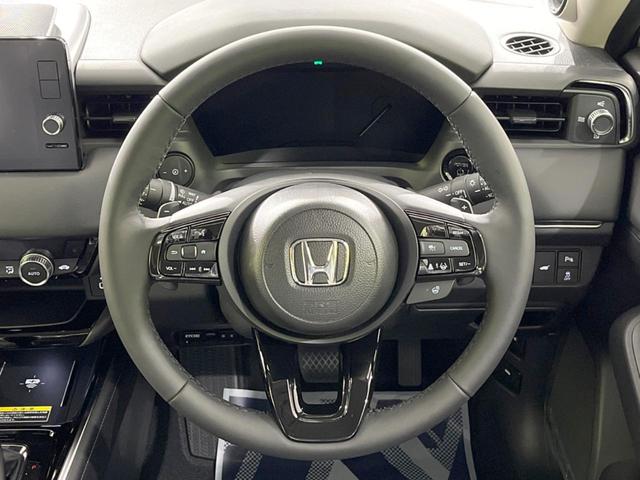 ヴェゼル ｅ：ＨＥＶ　Ｚ　登録済未使用車　メーカー９型ナビ　全周囲カメラ　プレミアムオーディオ　ホンダセンシング　アダプティブクルーズ　ＥＴＣ２．０　フルセグ　ワイヤレス充電　ハーフレザーシート　ハンズフリーパワーバックドア（11枚目）