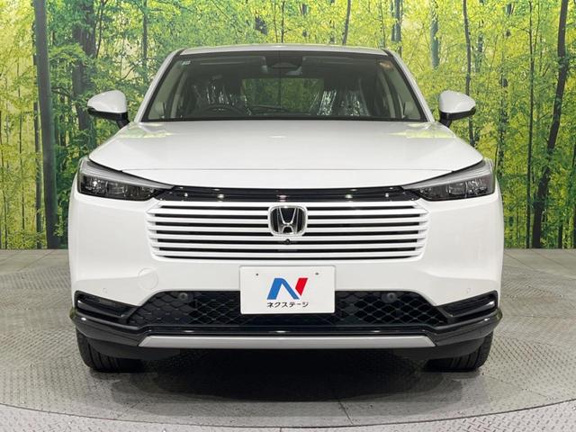 ヴェゼル ｅ：ＨＥＶ　Ｚ　登録済未使用車　メーカー９型ナビ　全周囲カメラ　プレミアムオーディオ　ホンダセンシング　アダプティブクルーズ　ＥＴＣ２．０　フルセグ　ワイヤレス充電　ハーフレザーシート　ハンズフリーパワーバックドア（14枚目）