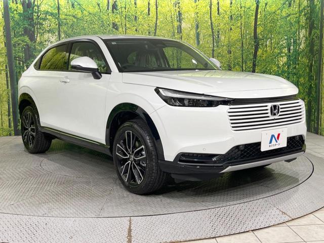 ヴェゼル ｅ：ＨＥＶ　Ｚ　登録済未使用車　メーカー９型ナビ　全周囲カメラ　プレミアムオーディオ　ホンダセンシング　アダプティブクルーズ　ＥＴＣ２．０　フルセグ　ワイヤレス充電　ハーフレザーシート　ハンズフリーパワーバックドア（16枚目）