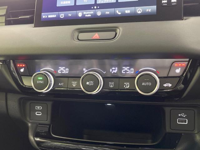 ヴェゼル ｅ：ＨＥＶ　Ｚ　登録済未使用車　メーカー９型ナビ　全周囲カメラ　プレミアムオーディオ　ホンダセンシング　アダプティブクルーズ　ＥＴＣ２．０　フルセグ　ワイヤレス充電　ハーフレザーシート　ハンズフリーパワーバックドア（27枚目）