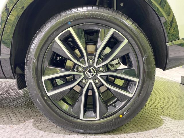 ヴェゼル ｅ：ＨＥＶ　Ｚ　登録済未使用車　メーカー９型ナビ　全周囲カメラ　プレミアムオーディオ　ホンダセンシング　アダプティブクルーズ　ＥＴＣ２．０　フルセグ　ワイヤレス充電　ハーフレザーシート　ハンズフリーパワーバックドア（62枚目）