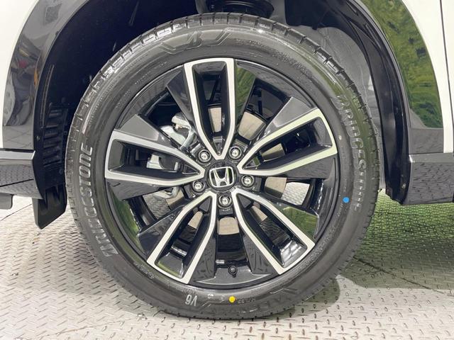 ヴェゼル ｅ：ＨＥＶ　Ｚ　登録済未使用車　メーカー９型ナビ　全周囲カメラ　プレミアムオーディオ　ホンダセンシング　アダプティブクルーズ　ＥＴＣ２．０　フルセグ　ワイヤレス充電　ハーフレザーシート　ハンズフリーパワーバックドア（63枚目）