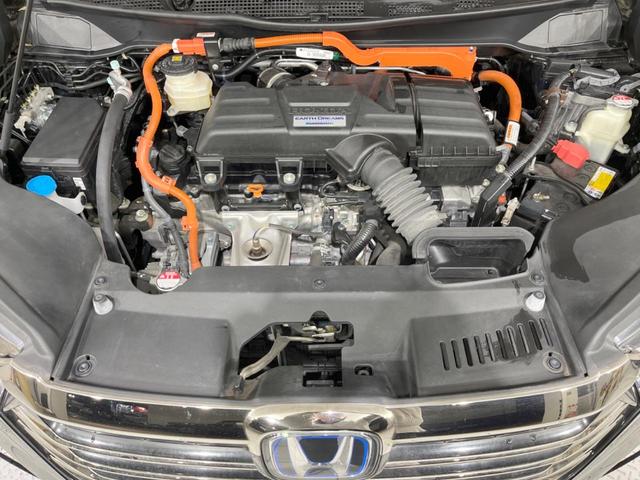オデッセイハイブリッド e:HEVアブソルート・EX 後席モニター 純正10型ナビ 全周囲カメラ 両側電動スライドドア 100V電源 ホンダセンシング BSM 禁煙車 電動リアゲート ハーフレザーシート シートヒーター パワーシート 前後ドラレコ(18枚目)