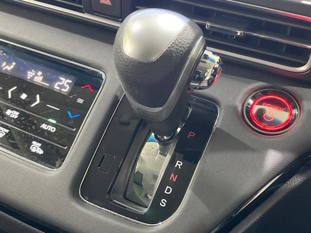 オデッセイハイブリッド e:HEVアブソルート・EX 後席モニター 純正10型ナビ 全周囲カメラ 両側電動スライドドア 100V電源 ホンダセンシング BSM 禁煙車 電動リアゲート ハーフレザーシート シートヒーター パワーシート 前後ドラレコ(25枚目)