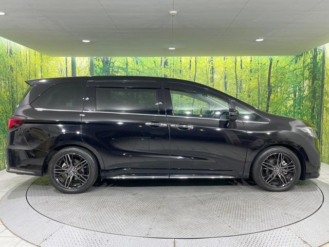 オデッセイハイブリッド e:HEVアブソルート・EX 後席モニター 純正10型ナビ 全周囲カメラ 両側電動スライドドア 100V電源 ホンダセンシング BSM 禁煙車 電動リアゲート ハーフレザーシート シートヒーター パワーシート 前後ドラレコ(70枚目)