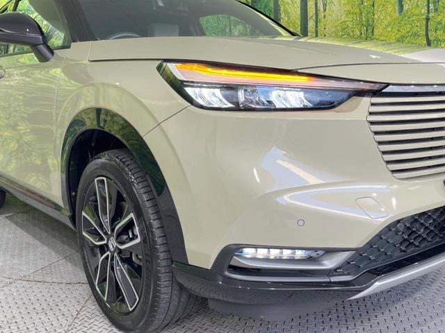 ヴェゼル ｅ：ＨＥＶ　ＰＬａＹ　パノラマルーフ　メーカー９型ナビ　バックカメラ　ホンダセンシング　ＢＳＭ　禁煙　電動リアゲート　ハーフレザーシート　デジタルインナーミラー　コーナーセンサー　シートヒーター　置くだけ充電　ＬＥＤヘッド（12枚目）