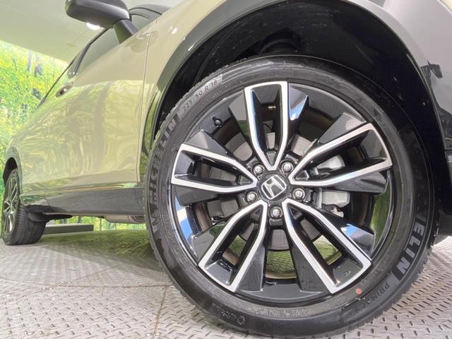 ヴェゼル ｅ：ＨＥＶ　ＰＬａＹ　パノラマルーフ　メーカー９型ナビ　バックカメラ　ホンダセンシング　ＢＳＭ　禁煙　電動リアゲート　ハーフレザーシート　デジタルインナーミラー　コーナーセンサー　シートヒーター　置くだけ充電　ＬＥＤヘッド（13枚目）