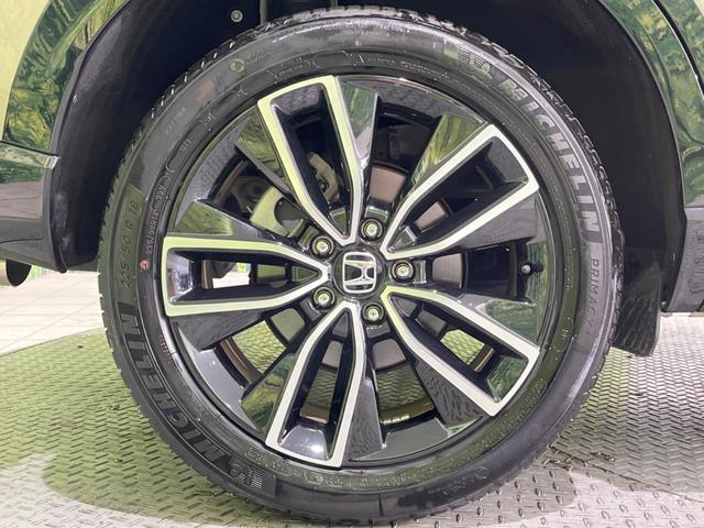 ヴェゼル ｅ：ＨＥＶ　ＰＬａＹ　パノラマルーフ　メーカー９型ナビ　バックカメラ　ホンダセンシング　ＢＳＭ　禁煙　電動リアゲート　ハーフレザーシート　デジタルインナーミラー　コーナーセンサー　シートヒーター　置くだけ充電　ＬＥＤヘッド（64枚目）