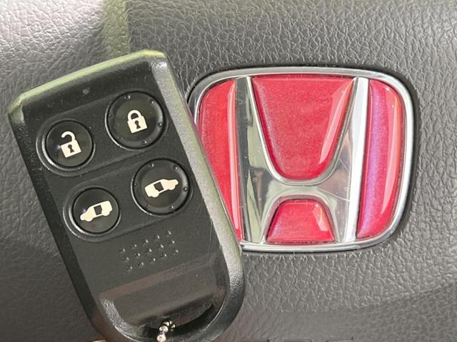 ステップワゴン G Lパッケージ 両側電動スライドドア HDDナビ リアスポイラー 禁煙車 ビルトインETC オートエアコン Bluetooth再生 CD DVD再生 地デジ 8人乗り キーレスアクセス(7枚目)