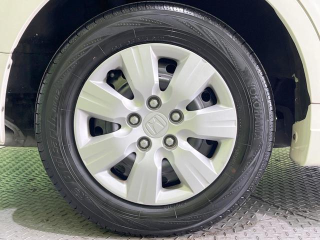 ステップワゴン G Lパッケージ 両側電動スライドドア HDDナビ リアスポイラー 禁煙車 ビルトインETC オートエアコン Bluetooth再生 CD DVD再生 地デジ 8人乗り キーレスアクセス(48枚目)