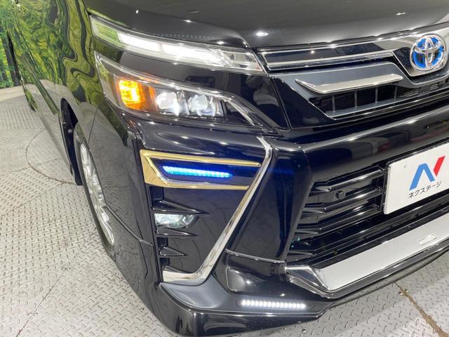 ヴォクシー ハイブリッドZS 煌III TRDフルエアロ 後席モニター 純正10.5型ナビ バックカメラ セーフティセンス 両側電動スライドドア 禁煙車 ハーフレザーシート シートヒーター ドラレコ コーナーセンサー LEDヘッド(12枚目)