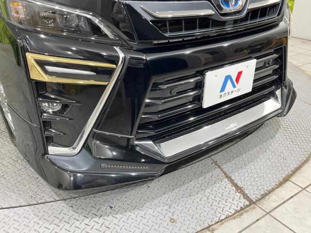ヴォクシー ハイブリッドZS 煌III TRDフルエアロ 後席モニター 純正10.5型ナビ バックカメラ セーフティセンス 両側電動スライドドア 禁煙車 ハーフレザーシート シートヒーター ドラレコ コーナーセンサー LEDヘッド(55枚目)