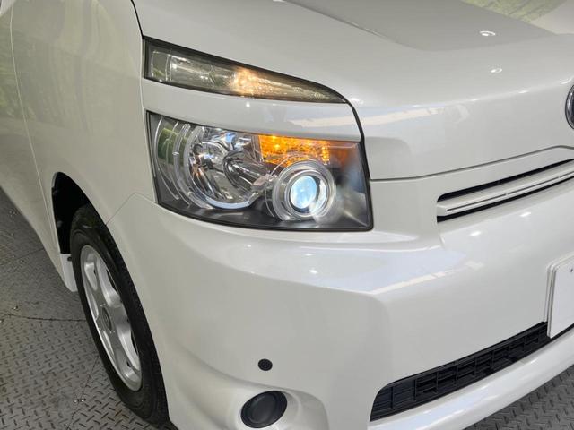 ヴォクシー X Lエディション 後席モニター 純正HDDナビ 電動スライドドア 禁煙車 スマートキー HIDヘッド デュアルエアコン CD/DVD再生 フルセグTV 15インチアルミホイール 8人乗り(13枚目)