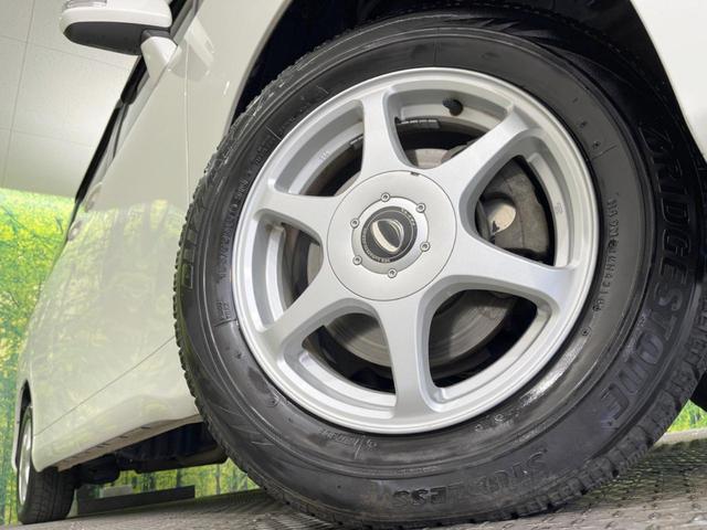 ヴォクシー X Lエディション 後席モニター 純正HDDナビ 電動スライドドア 禁煙車 スマートキー HIDヘッド デュアルエアコン CD/DVD再生 フルセグTV 15インチアルミホイール 8人乗り(14枚目)