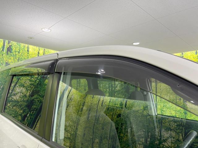 ヴォクシー X Lエディション 後席モニター 純正HDDナビ 電動スライドドア 禁煙車 スマートキー HIDヘッド デュアルエアコン CD/DVD再生 フルセグTV 15インチアルミホイール 8人乗り(35枚目)