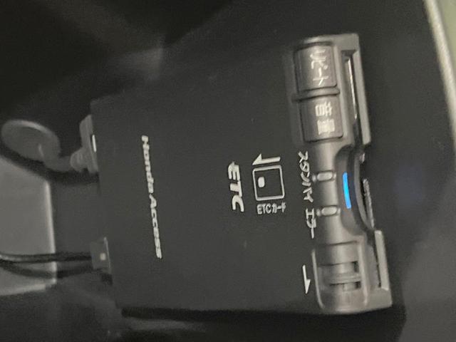 フリード Ｇ　Ｌパッケージ　後席モニター　メーカーＨＤＤナビ　バックカメラ　禁煙車　ＥＴＣ　オートエアコン　ＣＤ／ＤＶＤ再生　地デジＴＶ　ステアリングスイッチ　７人乗り　ウインカーミラー　２列目キャプテンシート（7枚目）