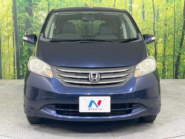 フリード Ｇ　Ｌパッケージ　後席モニター　メーカーＨＤＤナビ　バックカメラ　禁煙車　ＥＴＣ　オートエアコン　ＣＤ／ＤＶＤ再生　地デジＴＶ　ステアリングスイッチ　７人乗り　ウインカーミラー　２列目キャプテンシート（15枚目）