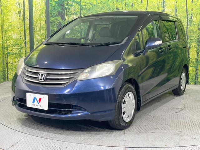 フリード Ｇ　Ｌパッケージ　後席モニター　メーカーＨＤＤナビ　バックカメラ　禁煙車　ＥＴＣ　オートエアコン　ＣＤ／ＤＶＤ再生　地デジＴＶ　ステアリングスイッチ　７人乗り　ウインカーミラー　２列目キャプテンシート（40枚目）