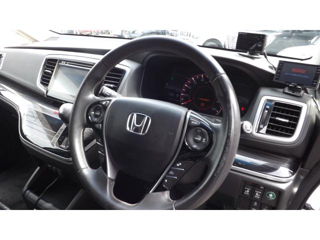 オデッセイ アブソルート・ＥＸ　ナビ／ＴＶ／Ｂｌｕｅｔｏｏｔｈ／全方位カメラ／ＨＤＭＩ／後席フリップダウンＭ／ＥＴＣ／黒本革パワーシート／両側自動ドア／レーダークルーズ／衝突軽減ブレーキ／ＢＳＭ／左右シートヒーター／記録簿付／禁煙（27枚目）