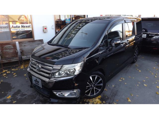 ステップワゴンスパーダ Ｚ　クールスピリット　大型９インチナビ／地Ｄフルセグ／バックカメラ／キセノン／スマートキー／ＥＴＣ／クルーズコントロール／両側自動ドア／パドルシフト／フルエアロ／ローダウン／ハーフレザー／禁煙車（2枚目）