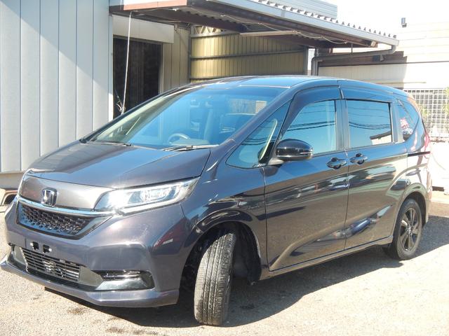 フリードハイブリッド ハイブリッド・Ｇブラックスタイル　フリップダウンモニター　純正ナビＴＶバックカメラ　カープレイ　両側電動スライド　ＥＴＣ　前後ドラレコ　前席シートヒーター　オートクルーズ（7枚目）