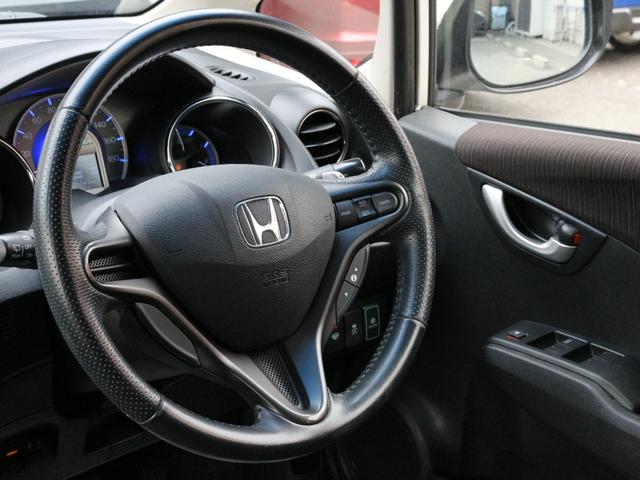 フィットハイブリッド ＸＨセレクション　ファインスタイル　ハーフレザーシート・Ｂｌｕｅｔｏｏｒｈ接続・フルセグ・シートヒーター・バックカメラ・クルーズコントロール・オートＡ／Ｃ・スマートキー・ＨＩＤヘッドライト・純正１５インチアルミ・パドルシフト・革巻きＨ（34枚目）